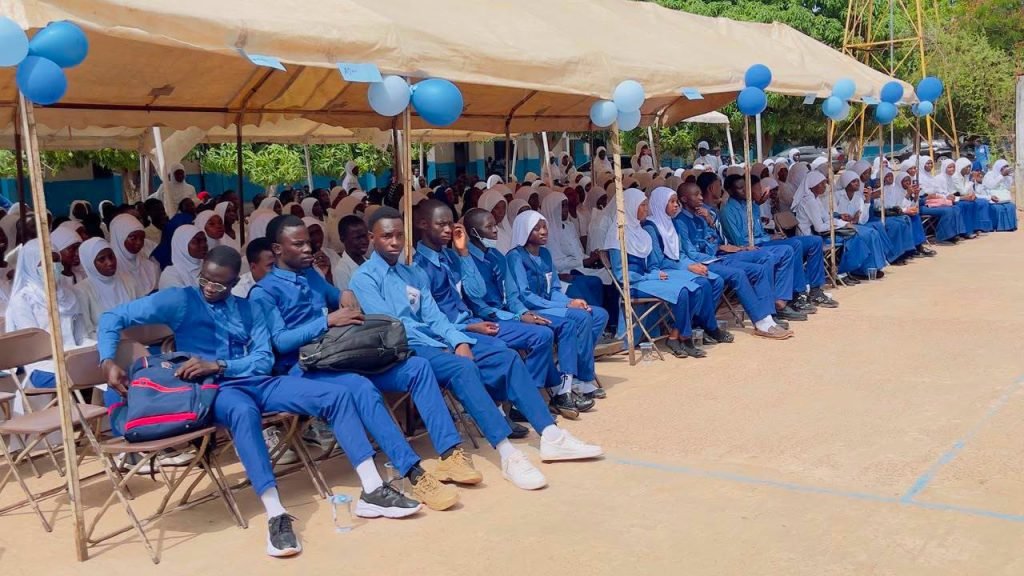 Learners and officials at a Ministry of Basic and Secondary Education activity